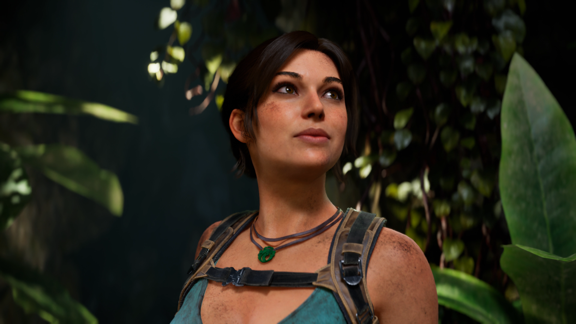 Lara Croft (Tomb Raider: Legacy of Atlantis) in a lush jungle, teal top and explorer gear — 4K Ultra HD video game PC desktop wallpaper.