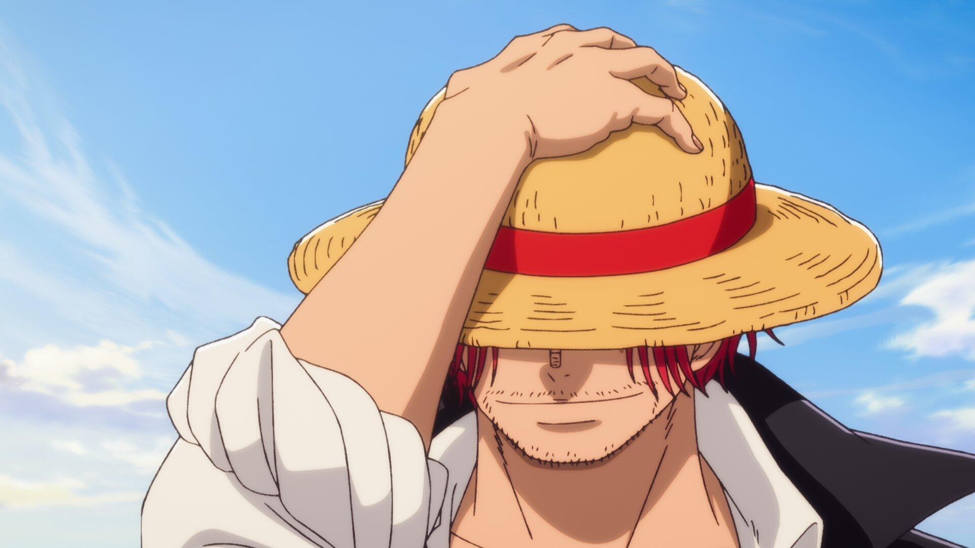 HD PC desktop wallpaper of One Piece's Shanks tipping his straw hat, scarred face half-hidden beneath a clear blue sky.