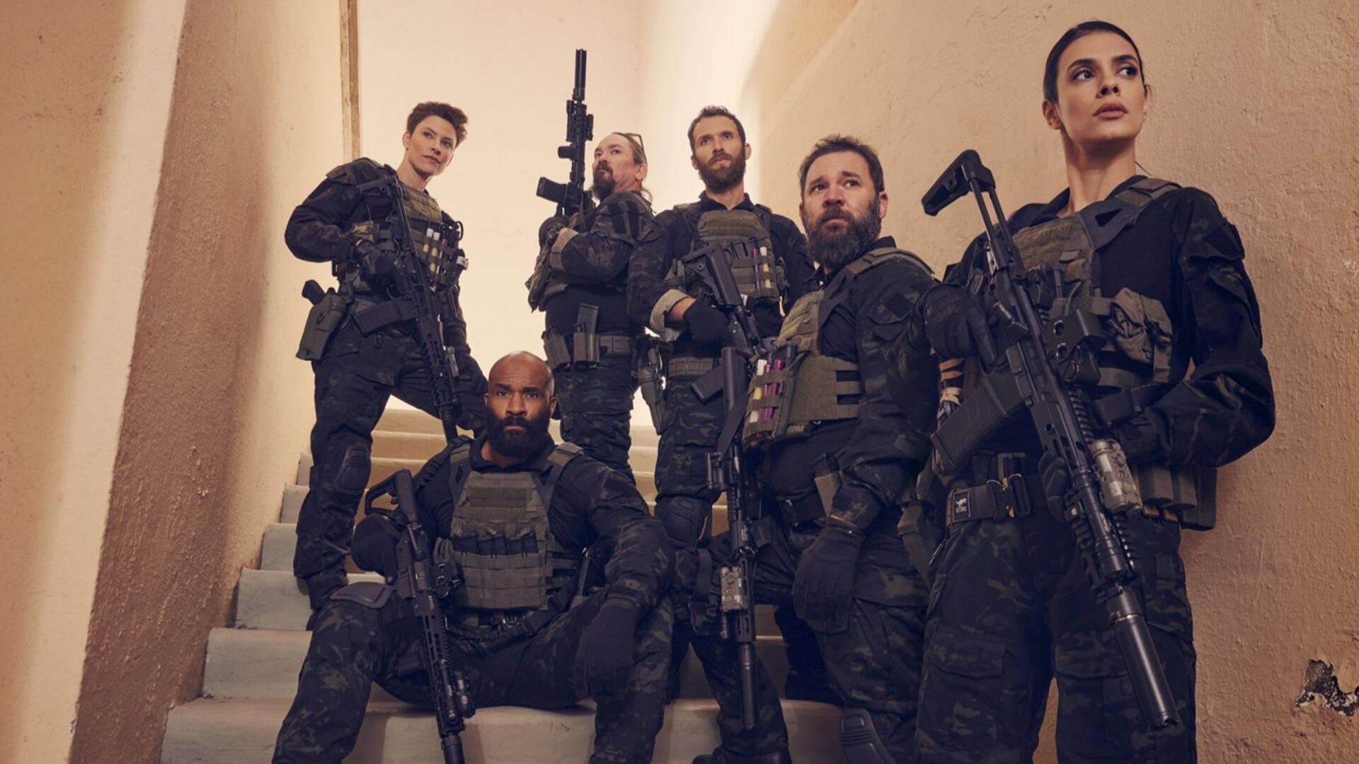 Special Ops: Lioness 4K Ultra HD PC desktop wallpaper: six armed tactical operators in black gear posed on a stairwell.