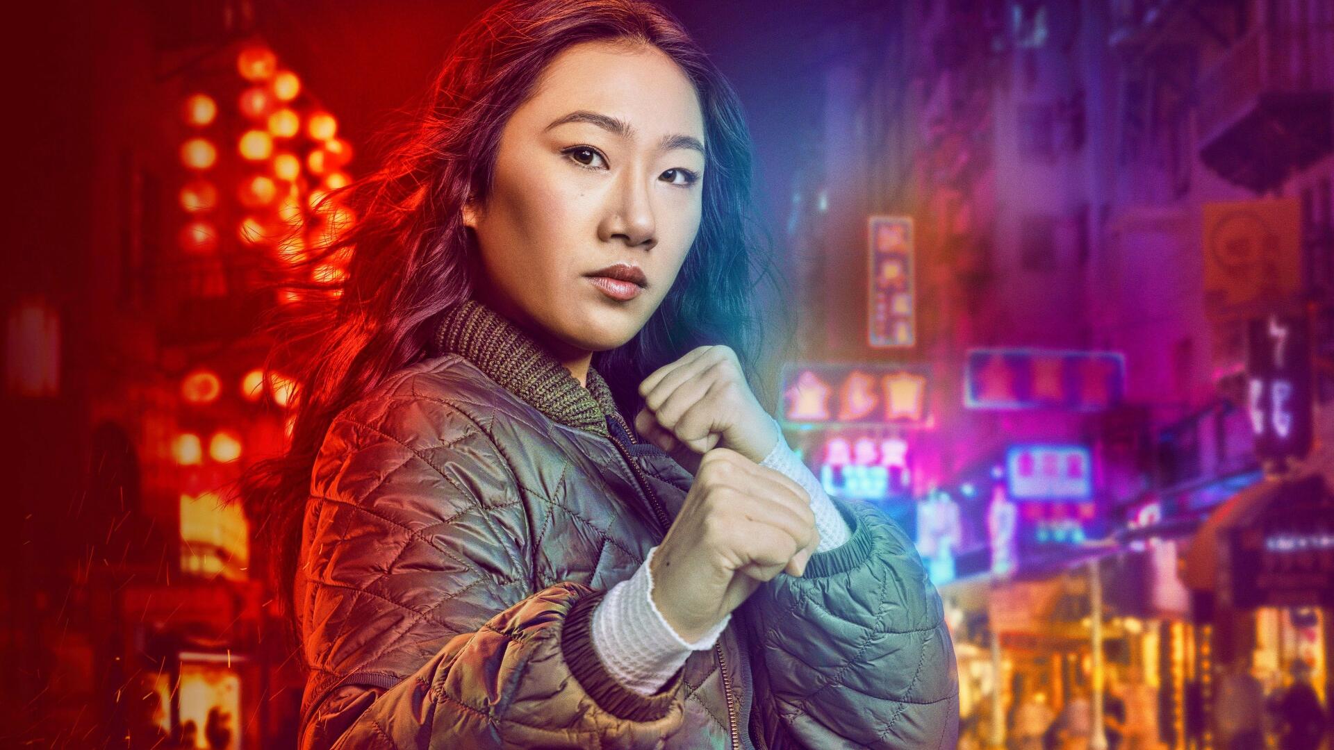 4K Ultra HD PC desktop wallpaper for Kung Fu (TV show): young woman in a martial-arts stance, wearing a quilted jacket against a neon-lit city nightscape.