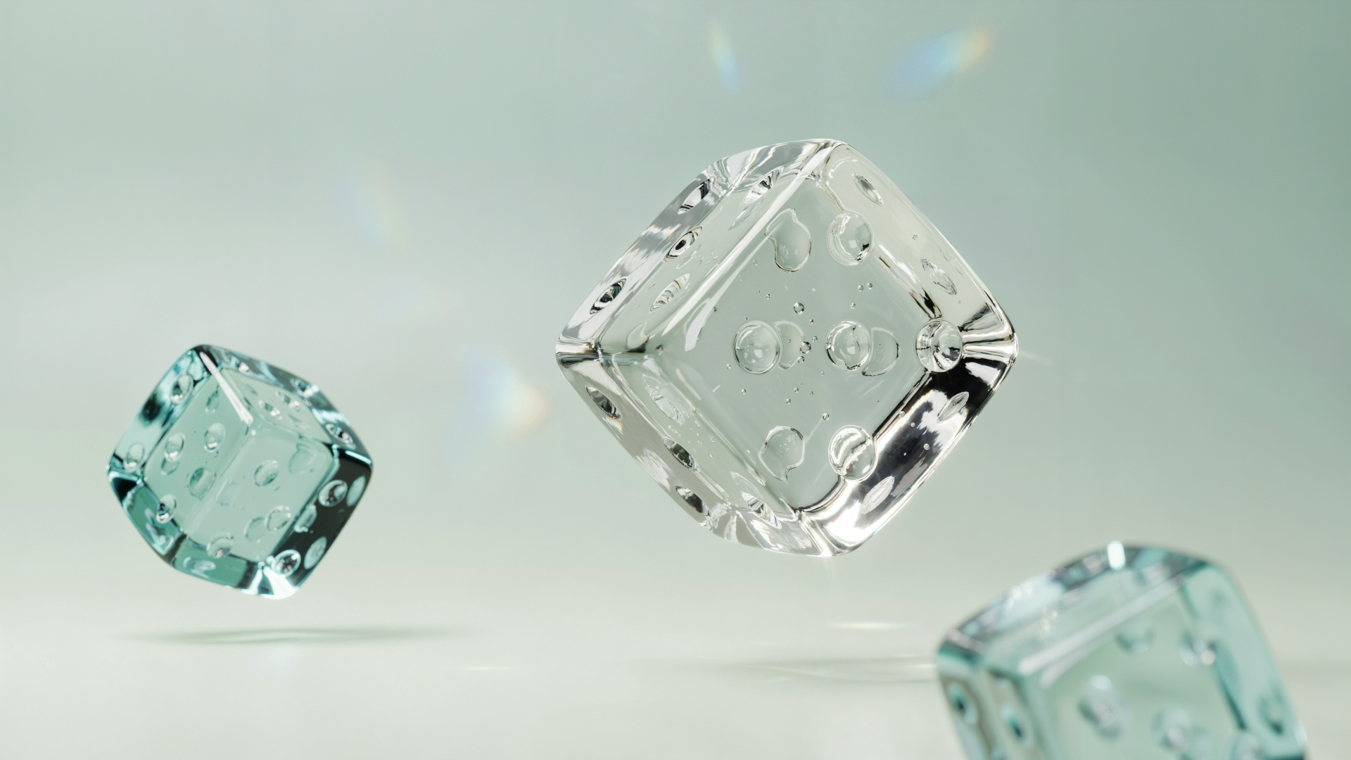 Three crystal glass dice cubes float above a soft mint backdrop, rendered as a 4K Ultra HD PC desktop wallpaper.