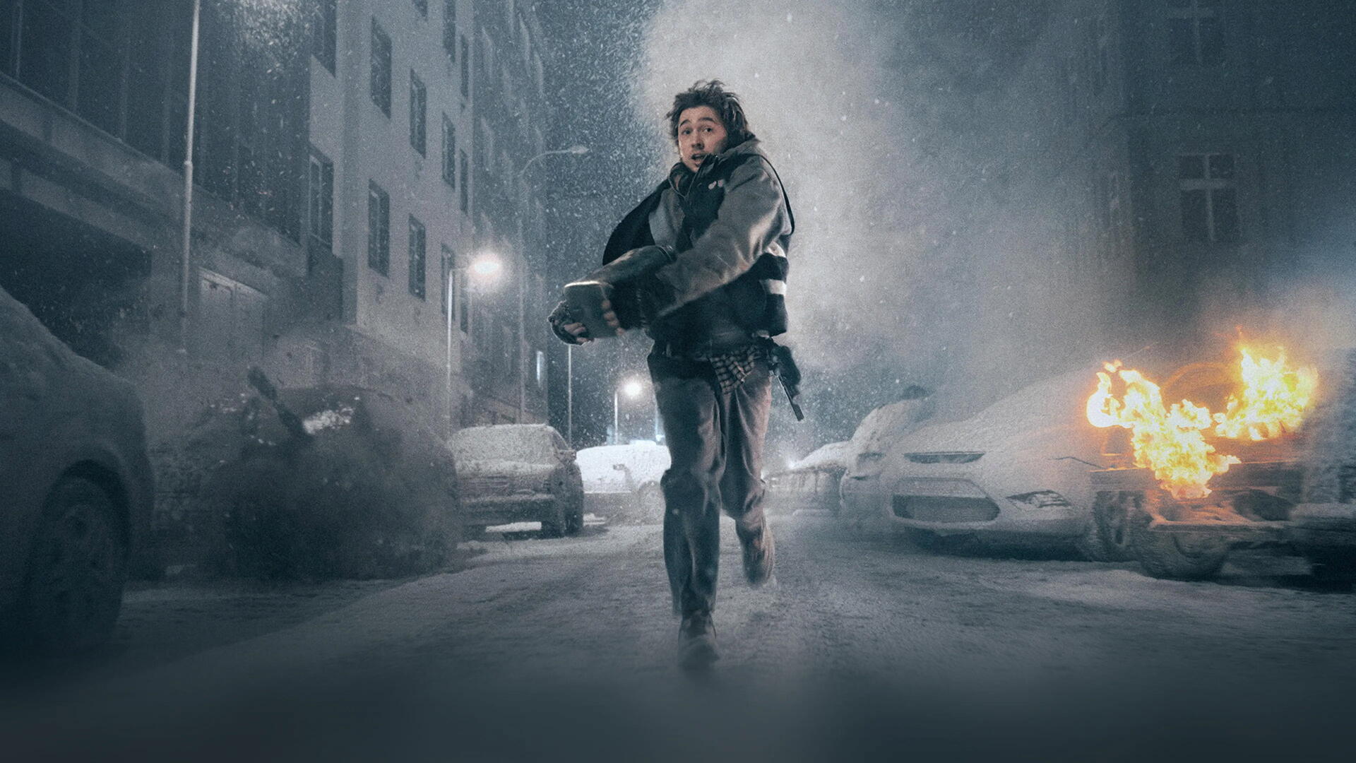 Resident Evil hero running through a snowy, war-torn city as cars burn, featured in a 4K Ultra HD PC desktop wallpaper and background.