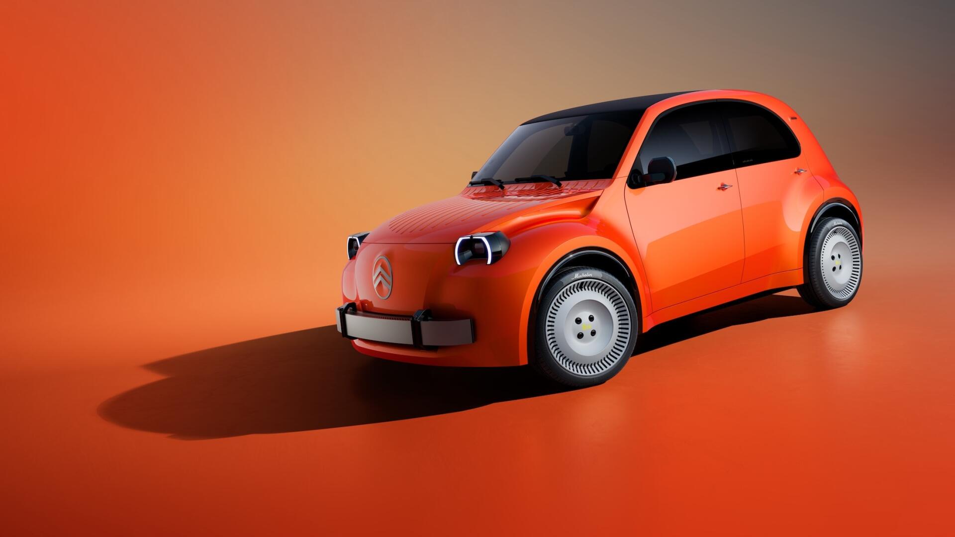 Orange Citroën 2CV concept car with a Volkswagen badge on a warm studio background, HD desktop wallpaper.