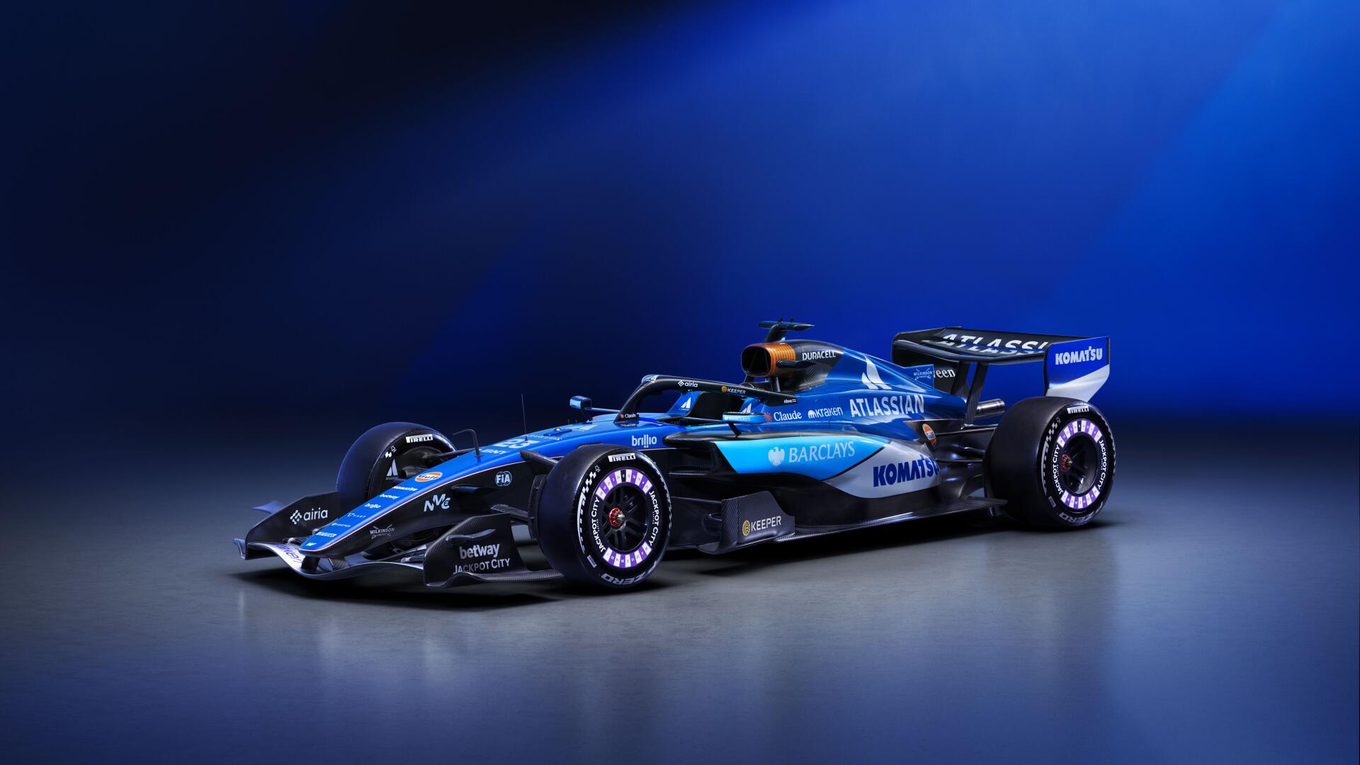 Williams FW48 Formula One race car on a blue studio backdrop, featured in a 5K Ultra HD PC desktop wallpaper and background.