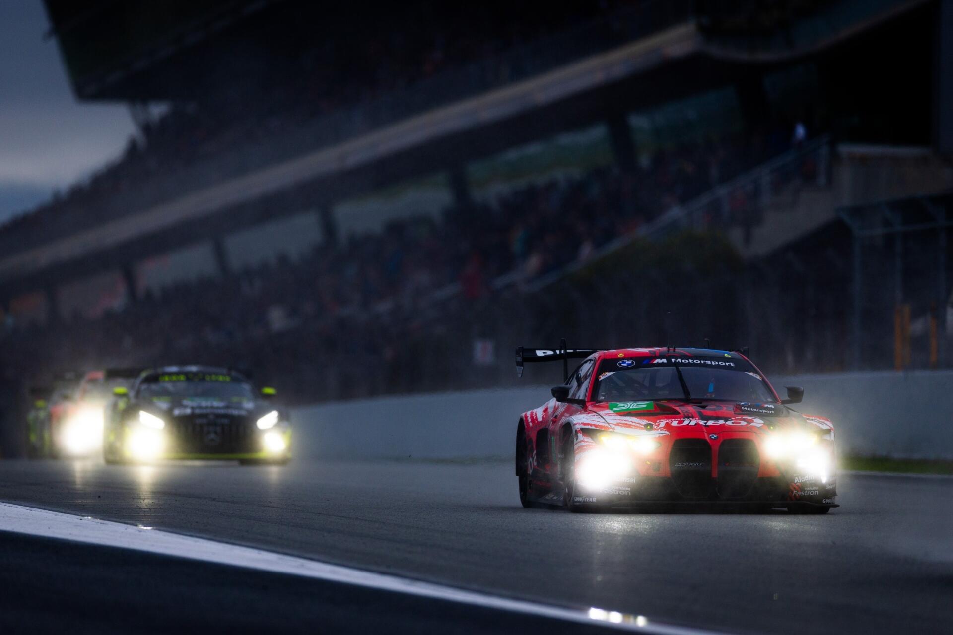 BMW M4 GT3 race cars speeding through a rainy FIA World Endurance Championship night race, HD desktop wallpaper