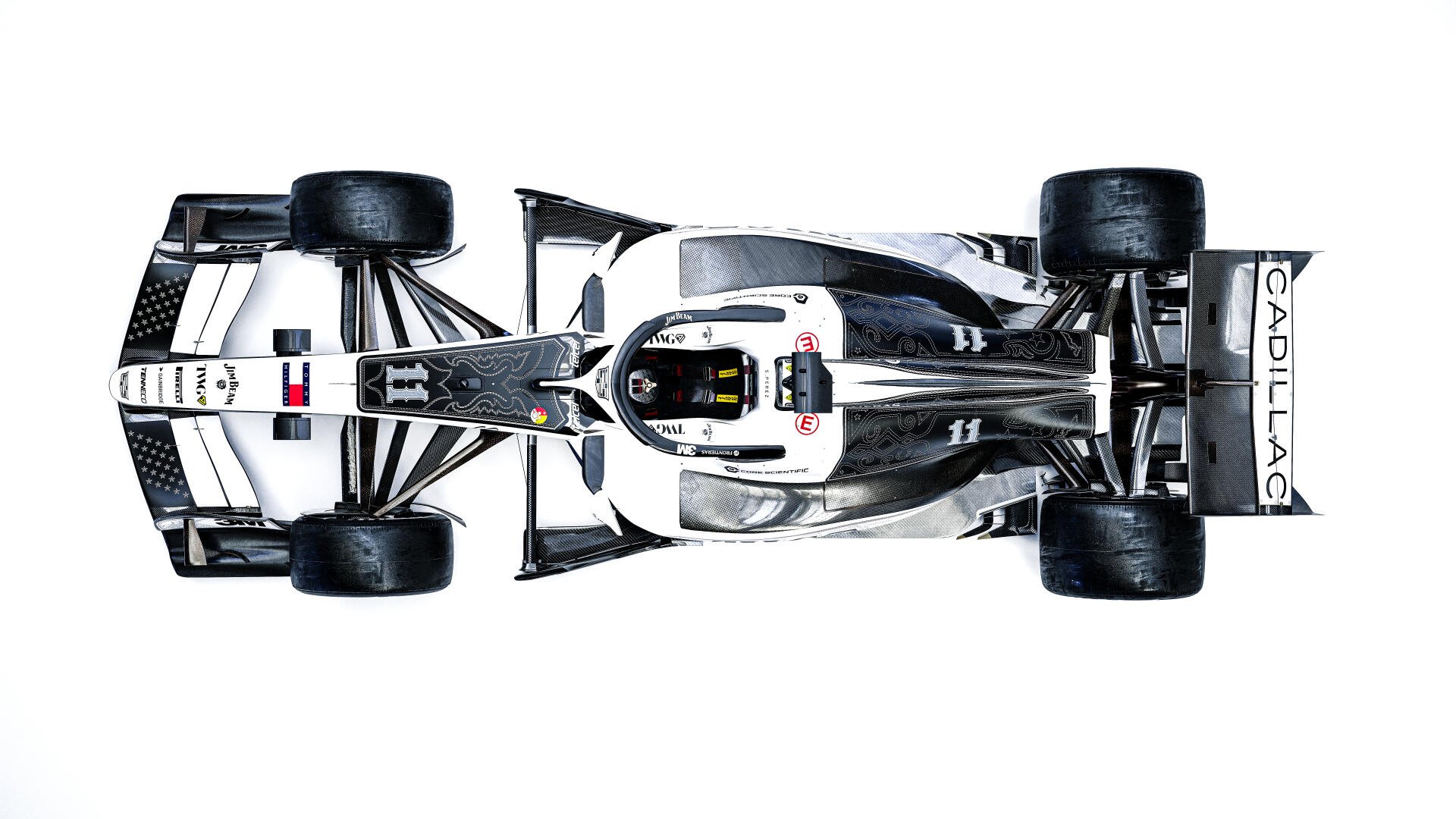 Top-down view of the Cadillac MAC-26 Formula One race car in an 8K Ultra HD desktop wallpaper background.
