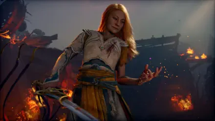 4K Ultra HD PC desktop wallpaper of Laufey from the God of War video game, standing amid burning ruins with blonde hair, holding a sword as embers glow around her.