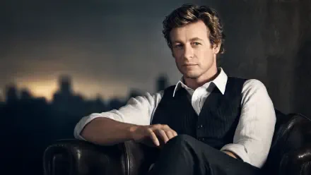 Patrick Jane seated in a vest and rolled sleeves against a moody city skyline — 4K Ultra HD PC desktop wallpaper background.