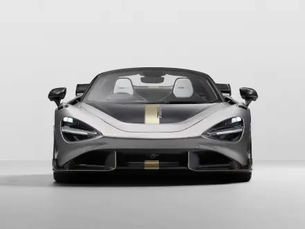 Front view of a silver McLaren 788HS sports car with a gold racing stripe, rendered as an 8K Ultra HD PC desktop wallpaper and background.