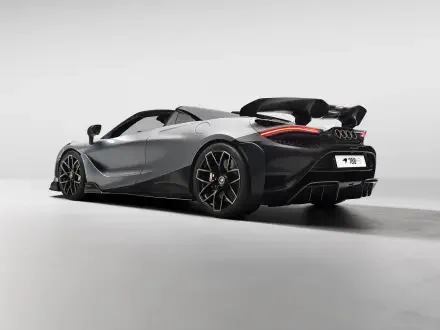 Silver McLaren 788HS roadster, rear three-quarter view with raised wing, studio-lit on a neutral backdrop — 8K Ultra HD PC desktop wallpaper vehicle image.