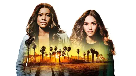 L.A.'S Finest 4K Ultra HD PC desktop wallpaper: two female detectives portrait blended with a golden Los Angeles palm-tree sunset over the beach skyline.
