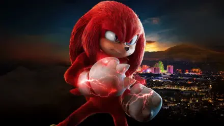 Knuckles (2024) snarling with crackling, glowing fists above a neon-lit city at dusk — 4K Ultra HD PC desktop wallpaper and background.