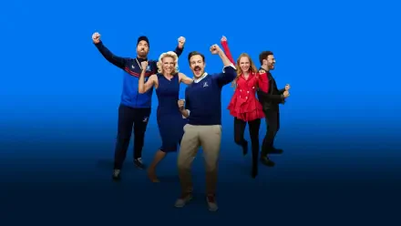 Ted Lasso 4K Ultra HD PC desktop wallpaper: upbeat ensemble of show characters cheering on a clean blue gradient background.