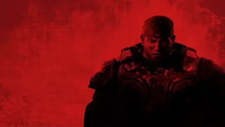 HD PC desktop wallpaper of Marcus Fenix in heavy armor, brooding against a blood-red E-Day backdrop from Gears of War.