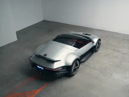 Silver Alpine A310 Vision concept sports car in a sleek rear three-quarter view, featured in a 5K Ultra HD desktop wallpaper.