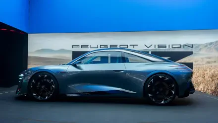 Peugeot RCZ Vision electric concept car in side profile, featured in a 2K Quad HD PC desktop wallpaper and background.