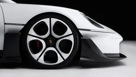 Close-up of a Porsche Mission S sports car wheel against a white body, featured in an HD PC desktop wallpaper and background.