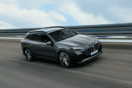 Gray Mercedes-AMG GT SUV driving on a highway, 2K Quad HD PC desktop wallpaper and background.