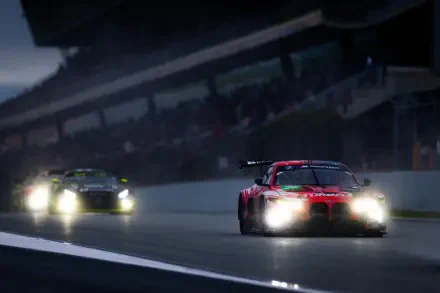 BMW M4 GT3 race cars speeding through a rainy FIA World Endurance Championship night race, HD desktop wallpaper