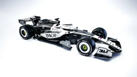 Cadillac MAC-26 F1 race car in Cadillac F1 Team livery, featured in an 8K Ultra HD PC desktop wallpaper and background.