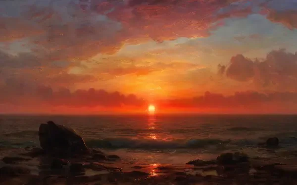 4K Ultra HD PC desktop wallpaper showing an ocean sunset: glowing sun on the horizon, colorful clouds and waves lapping a rocky shore.