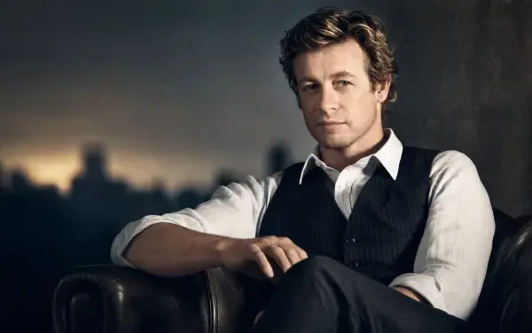 Patrick Jane seated in a vest and rolled sleeves against a moody city skyline — 4K Ultra HD PC desktop wallpaper background.