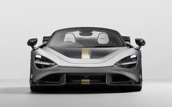 Front view of a silver McLaren 788HS sports car with a gold racing stripe, rendered as an 8K Ultra HD PC desktop wallpaper and background.