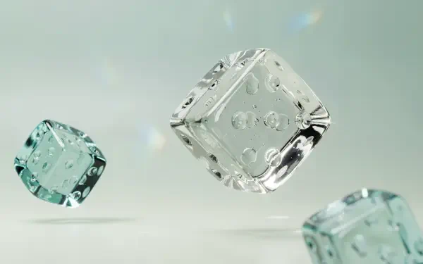 Three crystal glass dice cubes float above a soft mint backdrop, rendered as a 4K Ultra HD PC desktop wallpaper.