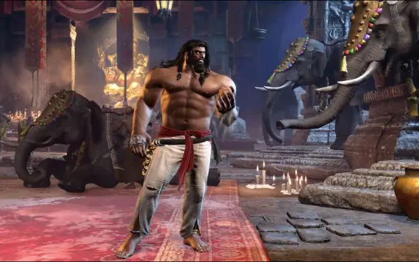 Street Fighter 6 HD PC desktop wallpaper: Arjun, bare-chested warrior in a temple, fists raised, candles lit and elephants looming behind him.