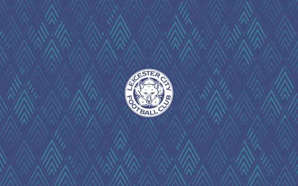 2K Quad HD PC desktop wallpaper: blue patterned background with repeating chevron motifs and a central circular Leicester City F.C. logo.