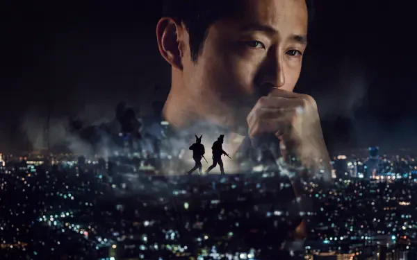 Steven Yeun in Animals (2026), contemplative portrait over a glowing nighttime cityscape, 5K Ultra HD desktop wallpaper.
