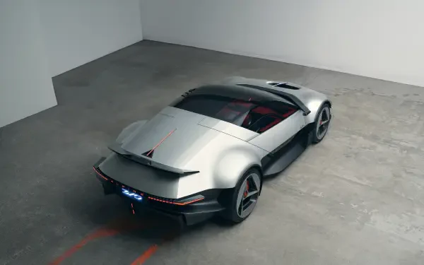 Silver Alpine A310 Vision concept sports car in a sleek rear three-quarter view, featured in a 5K Ultra HD desktop wallpaper.