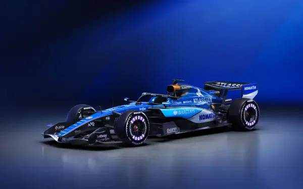 Williams FW48 Formula One race car on a blue studio backdrop, featured in a 5K Ultra HD PC desktop wallpaper and background.