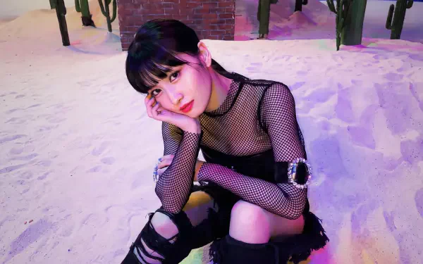 TWICE singer Momo, MiSaMo member and Japanese model, poses in a black outfit in this 5K Ultra HD desktop wallpaper.