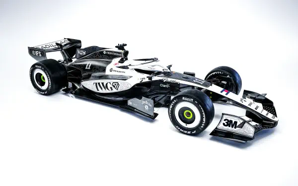 Cadillac MAC-26 F1 race car in Cadillac F1 Team livery, featured in an 8K Ultra HD PC desktop wallpaper and background.