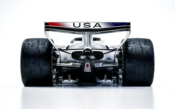 Rear view of the Cadillac MAC-26 F1 race car with USA rear wing, featured in an 8K Ultra HD desktop wallpaper.