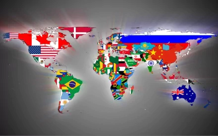 A colorful world map featuring various national flags, set against a sleek background, designed as an HD desktop wallpaper and background.