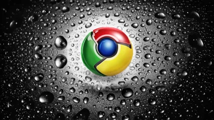 A high-definition desktop wallpaper featuring the Google Chrome logo surrounded by water droplets, set against a sleek, textured black background.