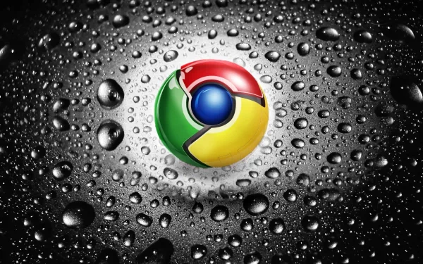 A high-definition desktop wallpaper featuring the Google Chrome logo surrounded by water droplets, set against a sleek, textured black background.