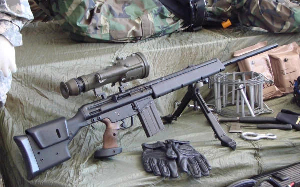 High-definition image of a sniper rifle displayed on a tactical background, featuring accessories like gloves and a scope, emphasizing its man-made design.