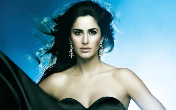 HD desktop wallpaper of Indian actress and celebrity Katrina Kaif, showcasing her in a glamorous pose with a blue background.
