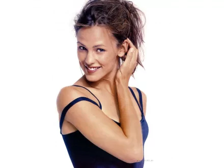 HD PC desktop wallpaper: portrait of a smiling female celebrity in a dark tank top, hand to hair, against a clean white background.
