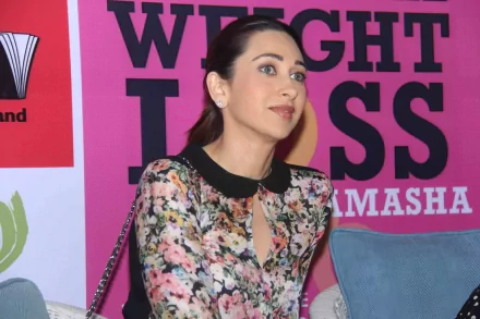 Seated woman in a floral dress with black collar against a bright pink WEIGHT LOSS backdrop — crisp 5K Ultra HD PC desktop wallpaper/background.