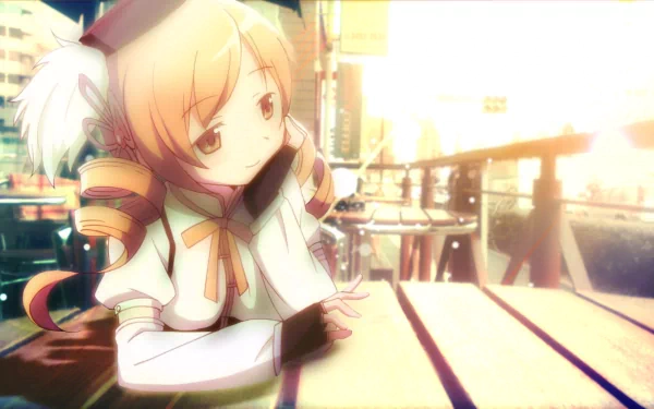 HD PC desktop wallpaper featuring Mami Tomoe from the anime Puella Magi Madoka Magica, depicted sitting thoughtfully at an outdoor table with a warm, glowing background.