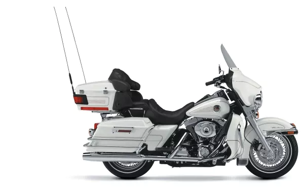 Harley-Davidson Electra Glide Ultra Classic motorcycle in white, showcased as a high-definition desktop wallpaper and background image.