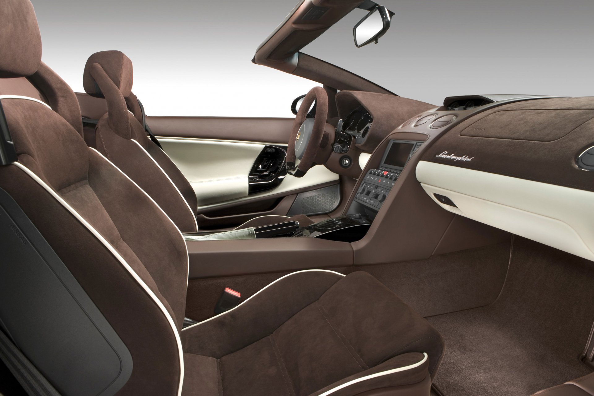 HD PC desktop wallpaper showcasing the luxurious brown interior of a Lamborghini vehicle, highlighting its sleek design and premium materials.