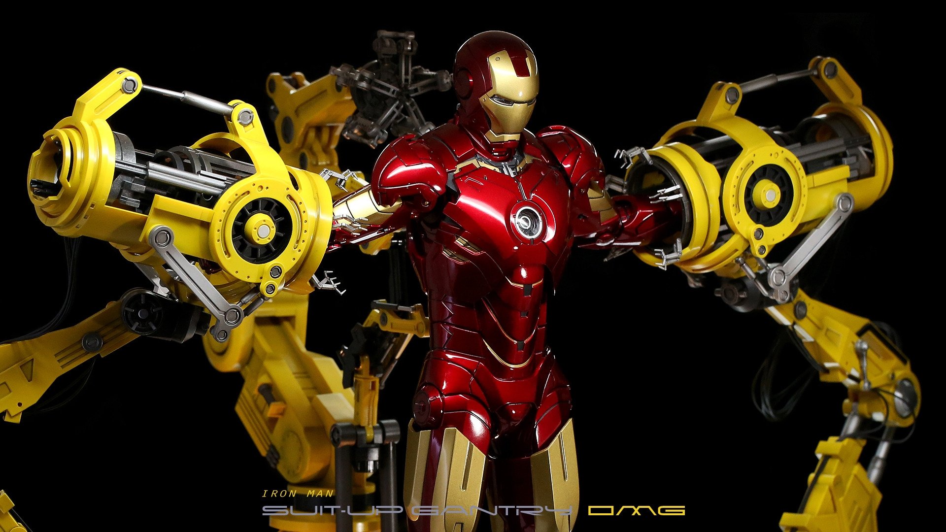 A dynamic HD desktop wallpaper featuring Iron Man in a striking pose, showcasing his iconic red armor and powerful yellow mechanical arms against a dark background.