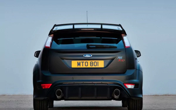 Rear view of a black Ford Focus RS500 with visible dual exhausts, captured as an HD PC desktop wallpaper showcasing the vehicle’s sporty design and distinctive features.