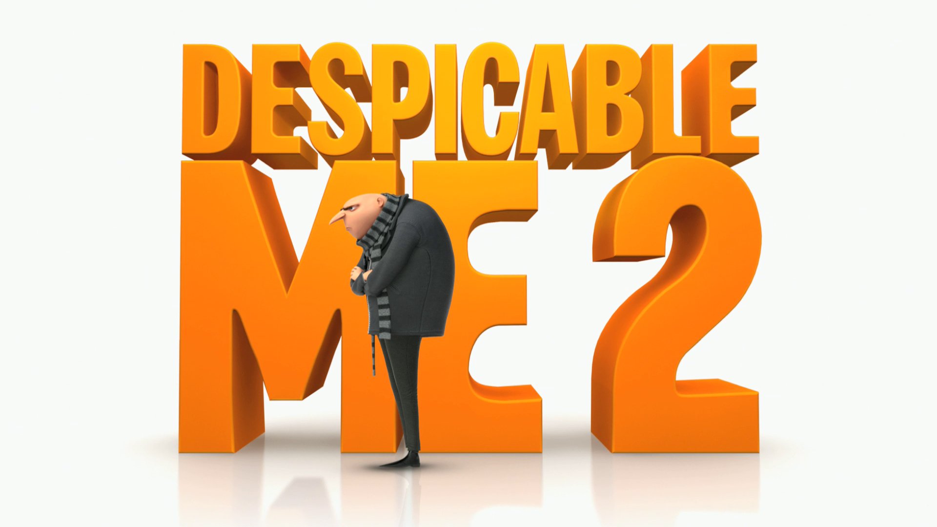 HD PC desktop wallpaper for the movie Despicable Me 2 showing Gru (Despicable Me) standing beside a large orange DESPICABLE ME 2 title on a white background.