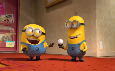 HD desktop wallpaper featuring Kevin and Bob from the Despicable Me movie, showing cute Minions joyfully interacting in a bright indoor setting.